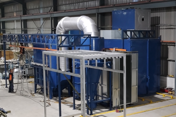 A blue color batch oven for powder coating services in Malaysia