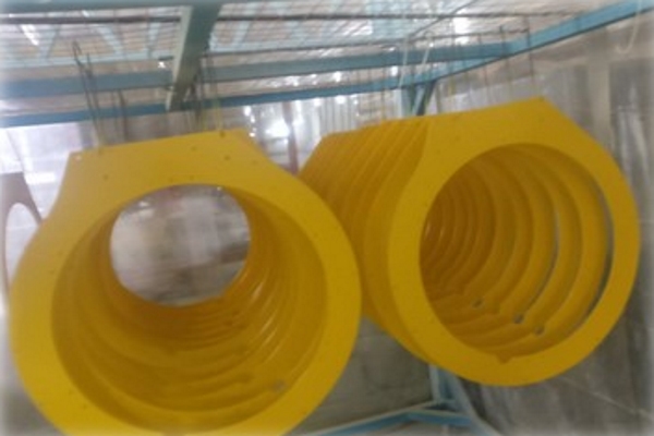 A batch of yellow coated metals during metal coating process in Malaysia